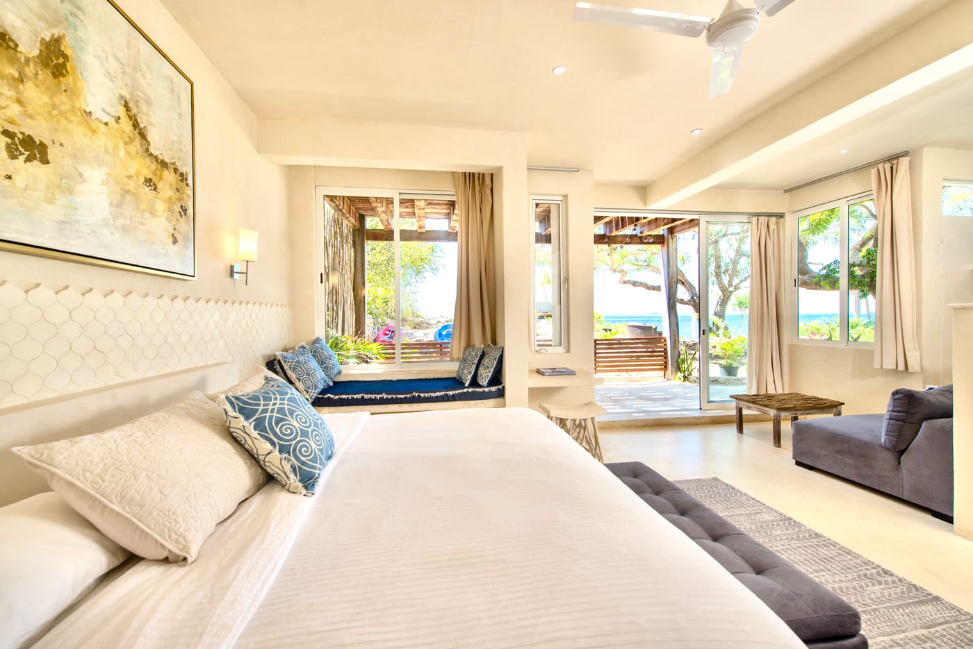 Bedroom with window-seat nook and terrace view