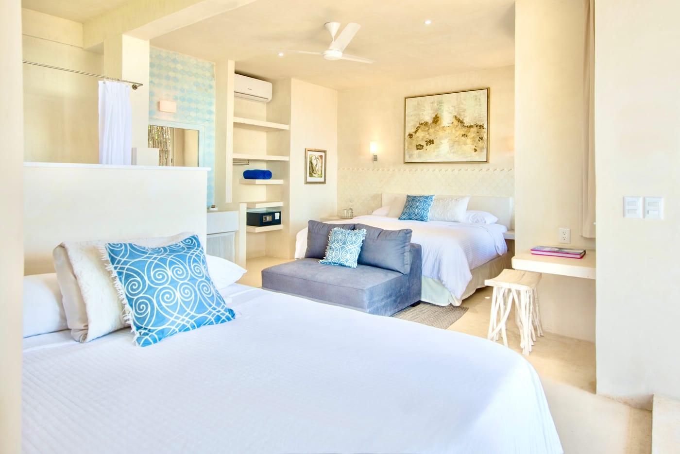 Guest room with two beds and closet nook